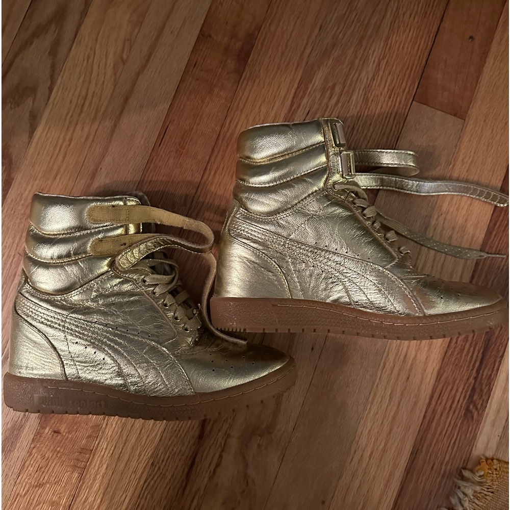 Only worn once gold platform sneakers